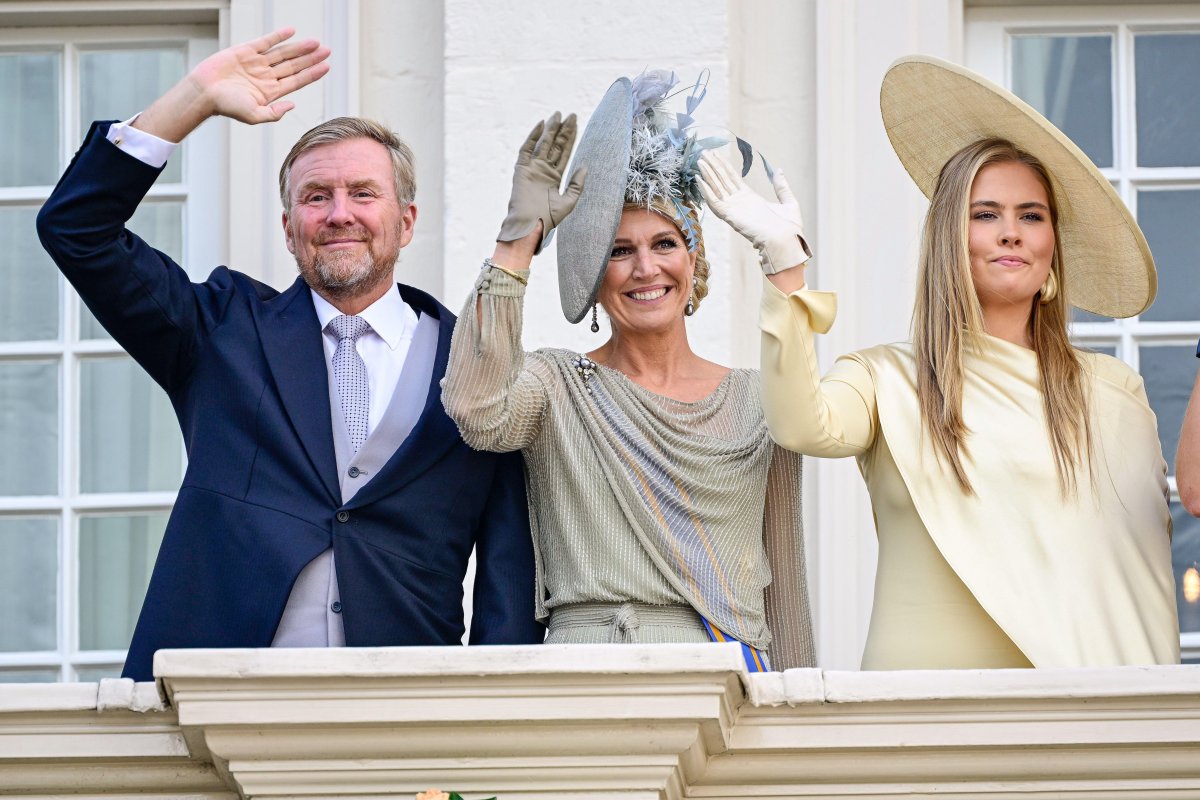 The King and Queen of the Netherlands and the Princess of Orange wave from the balcony of Noordeinde Palace in The Hague on September 16, 2025 (Patrick van Emst/NLBeeld/Alamy)