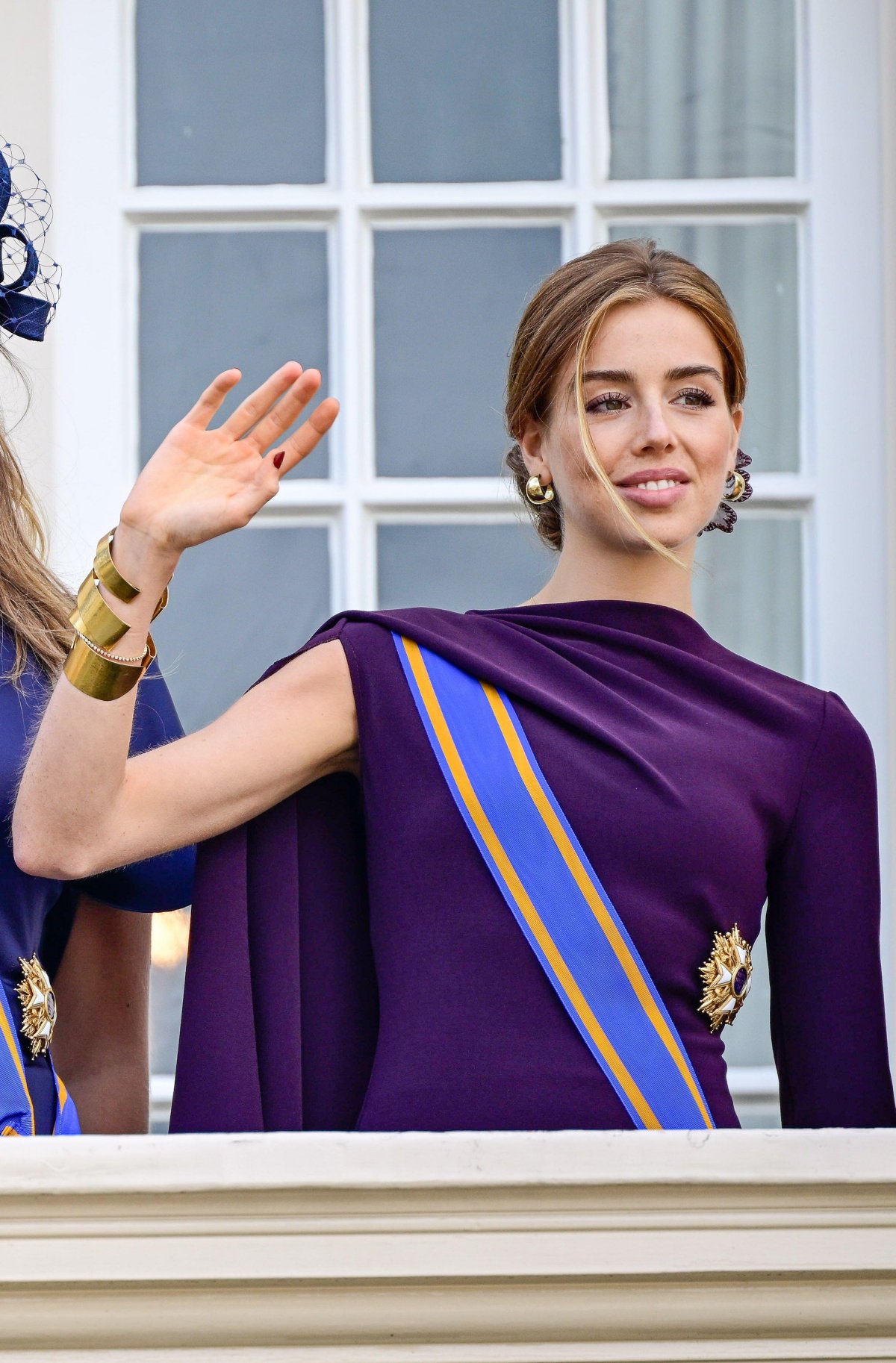 Princess Alexia of the Netherlands waves from the balcony of Noordeinde Palace in The Hague on September 16, 2025 (Patrick van Emst/NLBeeld/Alamy)