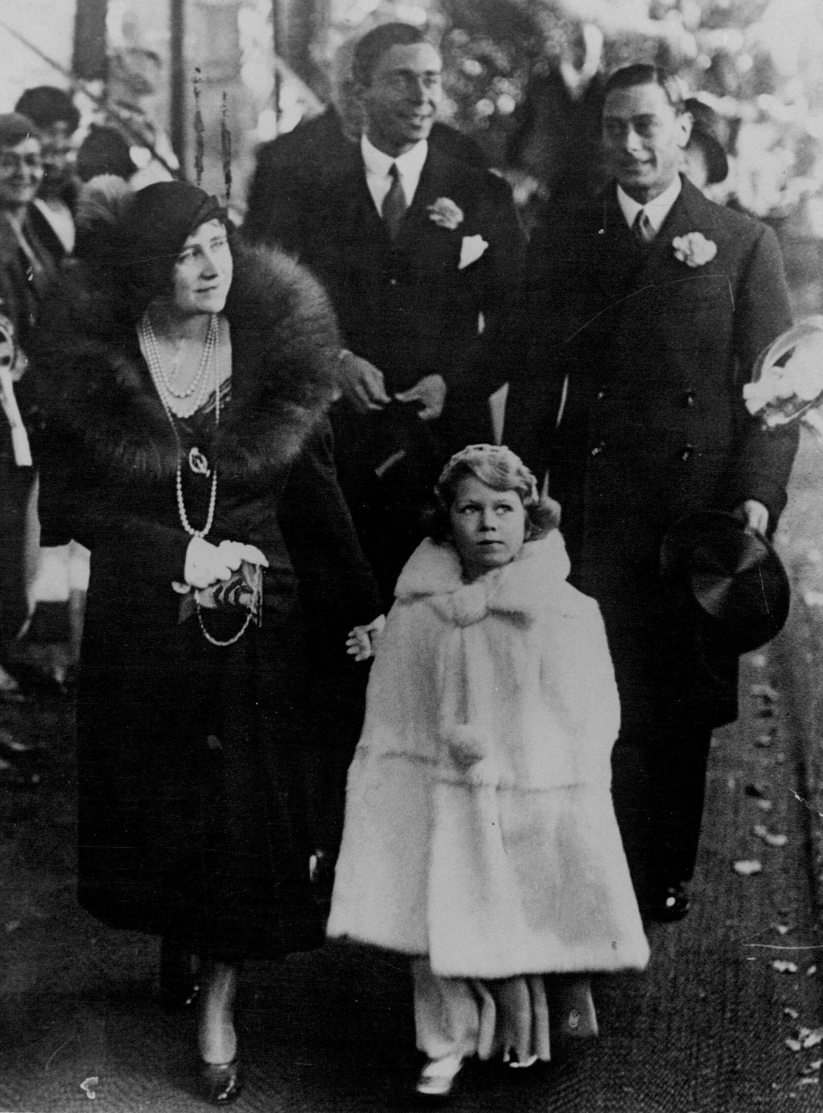 The Duke and Duchess of York, with Princess Elizabeth and Prince Gustaf Adolf of Sweden, leave St. Mary's Church in Balcombe, Sussex, after the wedding of Lady May Cambridge and Henry Abel Smith on October 24, 1931 (SuperStock/Alamy)