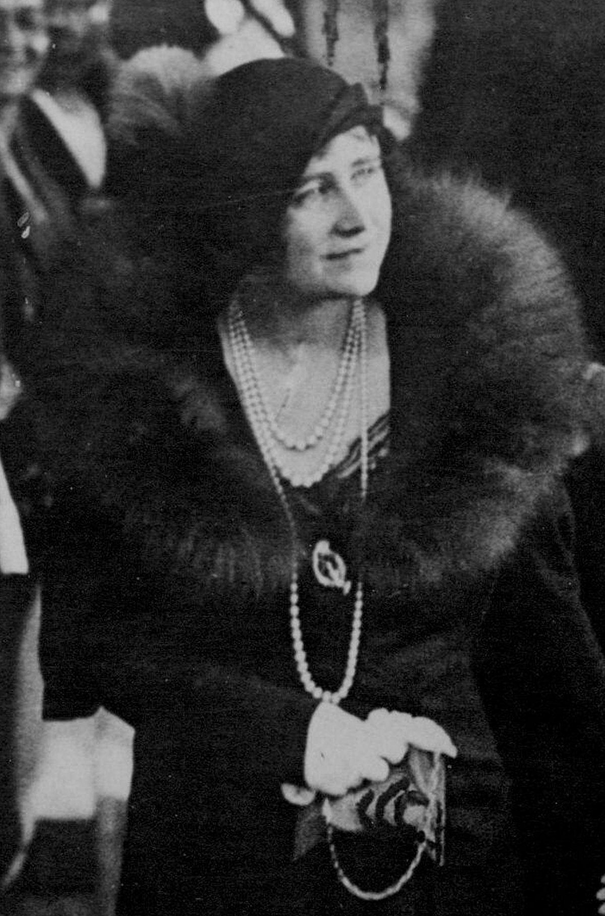 The Duchess of York leaves St. Mary's Church in Balcombe, Sussex, after the wedding of Lady May Cambridge and Henry Abel Smith on October 24, 1931 (SuperStock/Alamy)