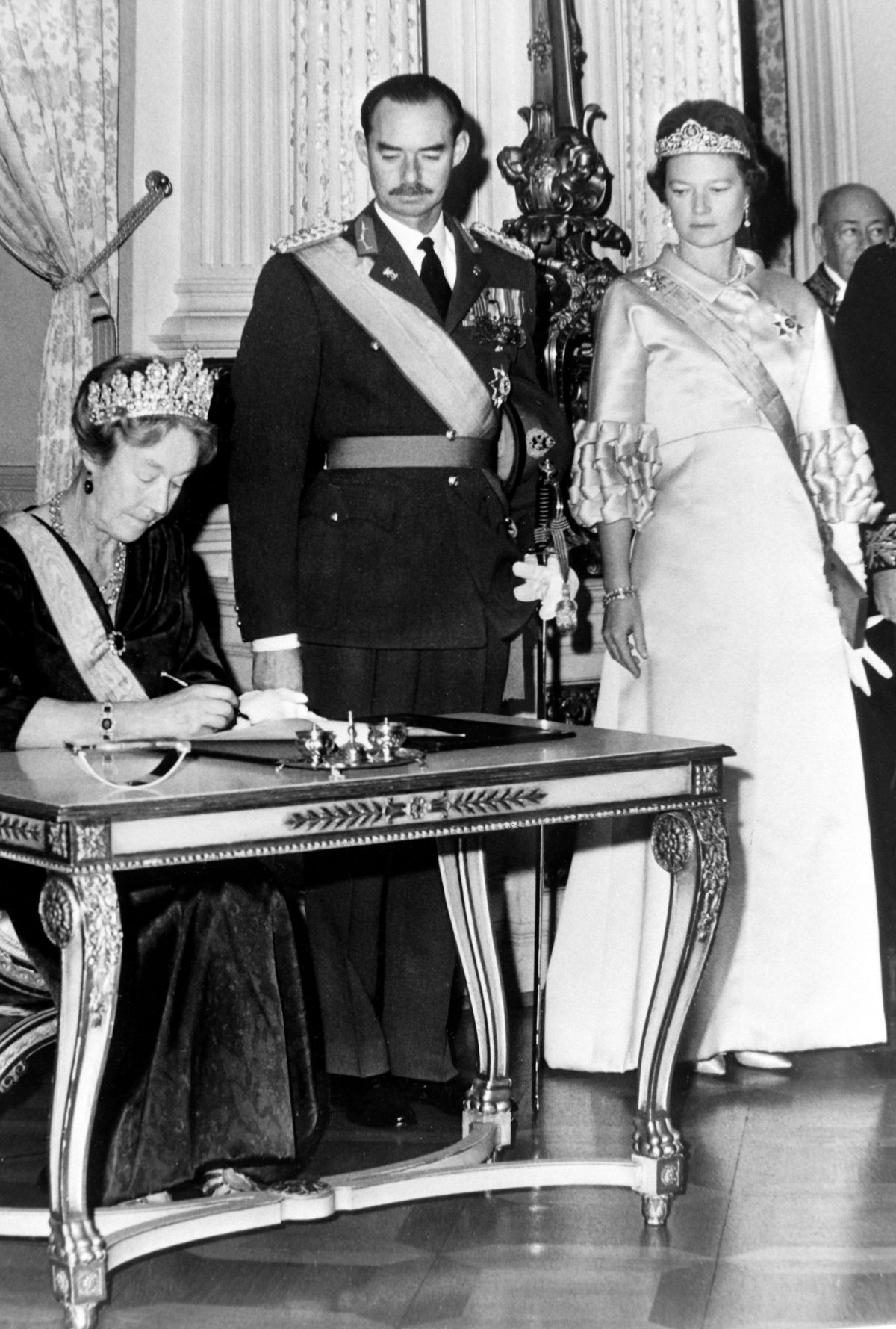 Grand Duchess Charlotte, Grand Duke Jean, and Grand Duchess Josephine-Charlotte of Luxembourg are pictured during Charlotte's abdication ceremony on November 12, 1964 (Smith Archive/Alamy)