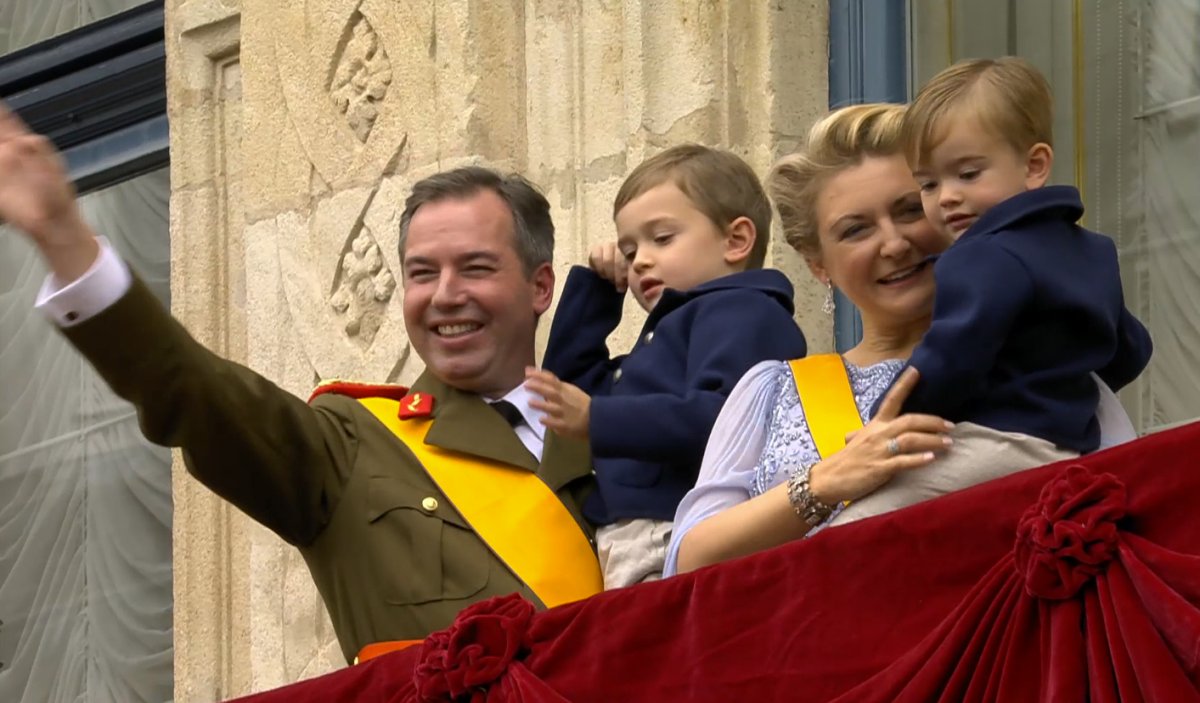 The Grand Duke and Grand Duchess of Luxembourg, with Prince Charles and Prince Francois, wave from the balcony of the Grand Ducal Palace on October 3, 2025 (Maison du Grand-Duc)