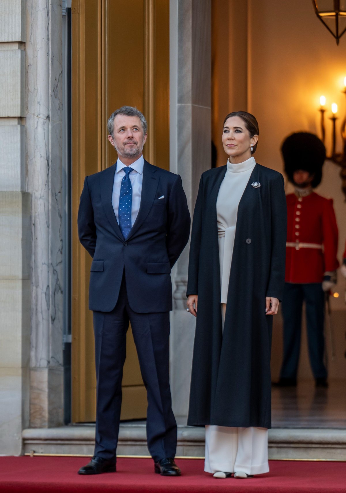 The King and Queen of Denmark are pictured ahead of a dinner given for EU heads of state and government at Amalienborg Palace in Copenhagen on October 1, 2025 (Michael Kappeler/DPA Picture Alliance/Alamy)