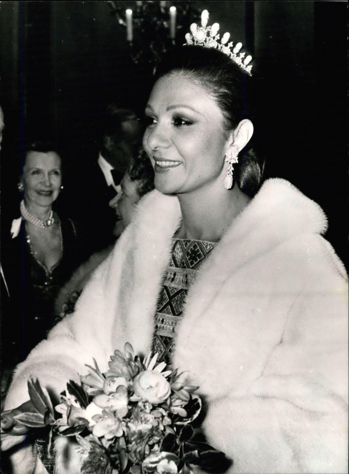 The Empress of Iran attends a ballet performance in Covent Garden during a visit to London, April 1976 (Keystone Press/Alamy)