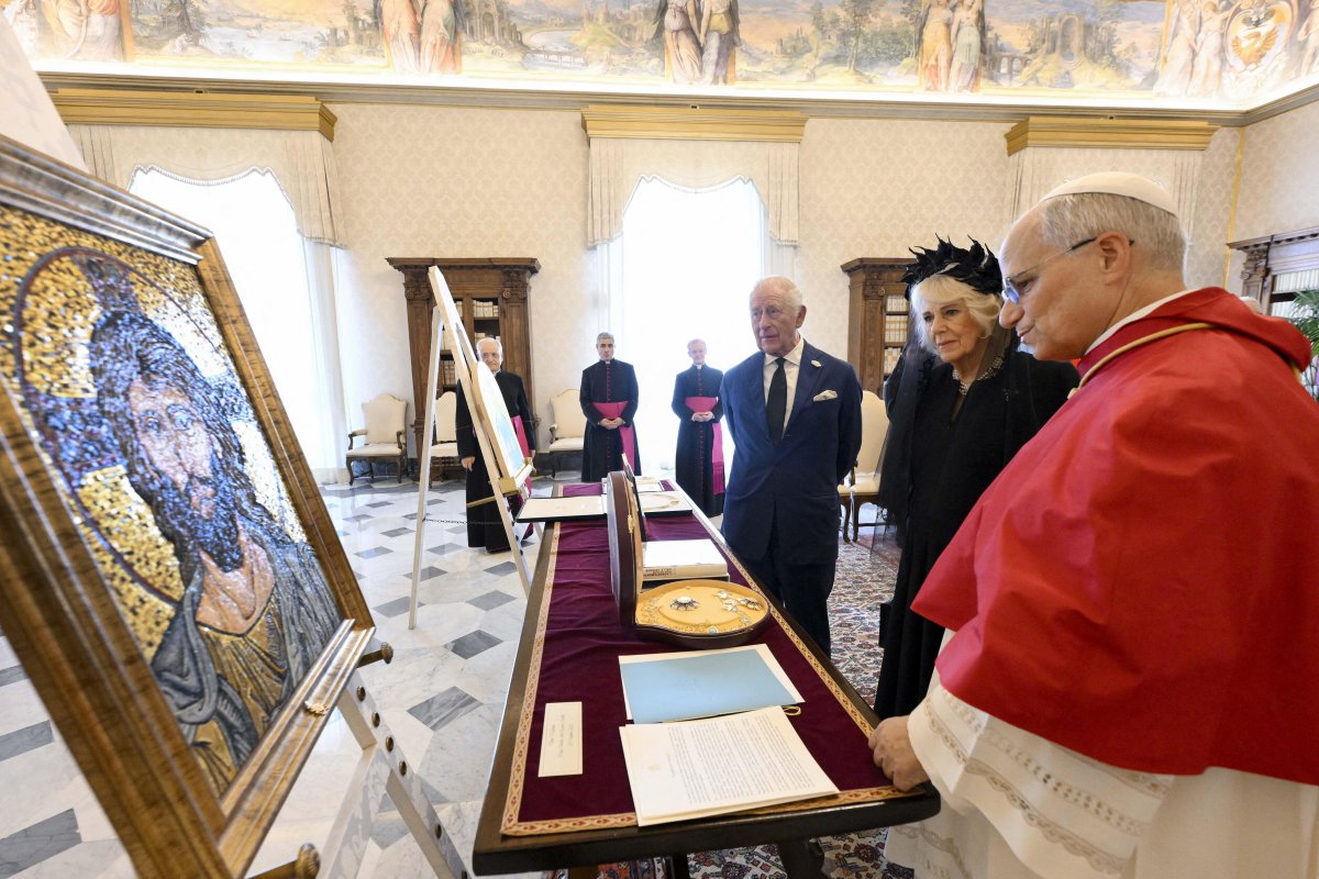 King Charles III and Queen Camilla exchange gifts with Pope Leo XIV during their state visit to the Vatican on October 23, 2025 (Vatican Media/Abaca Press/Alamy)