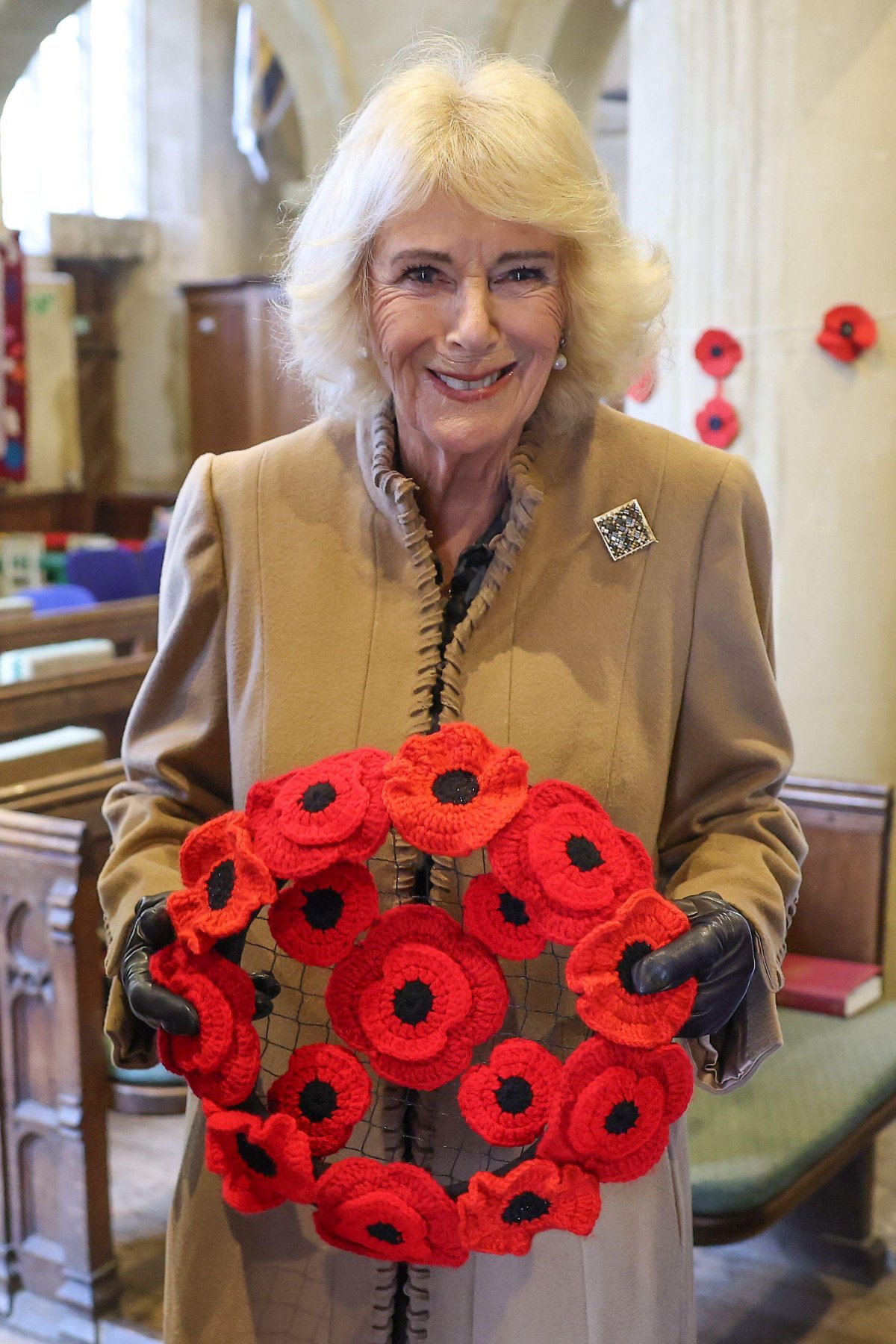 Queen Camilla visits The Poppy Project at St. Bartholomew's Church in Corsham, Wiltshire, on October 28, 2025 (Chris Jackson/PA Images/Alamy)