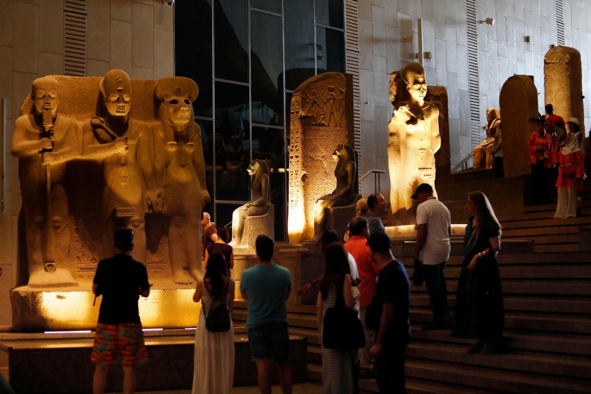 Tourists view exhibits at the Grand Egyptian Museum ahead of its official opening in Cairo on October 14, 2025 (Ahmed Gomaa/Xinhua/Alamy)