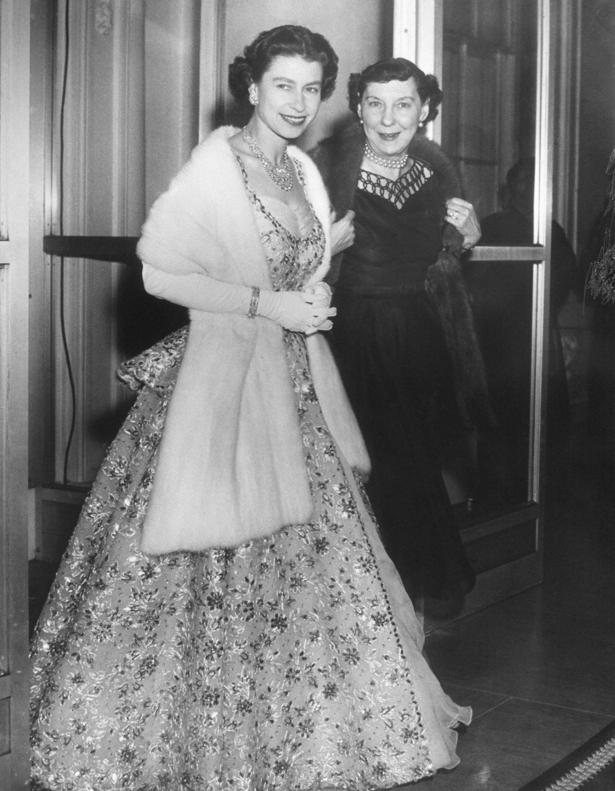 Queen Elizabeth II and Mamie Eisenhower are pictured at the Commonwealth Dinner held at the Australian Embassy in Washington, D.C., on October 20, 1957 (Everett Collection/Alamy)