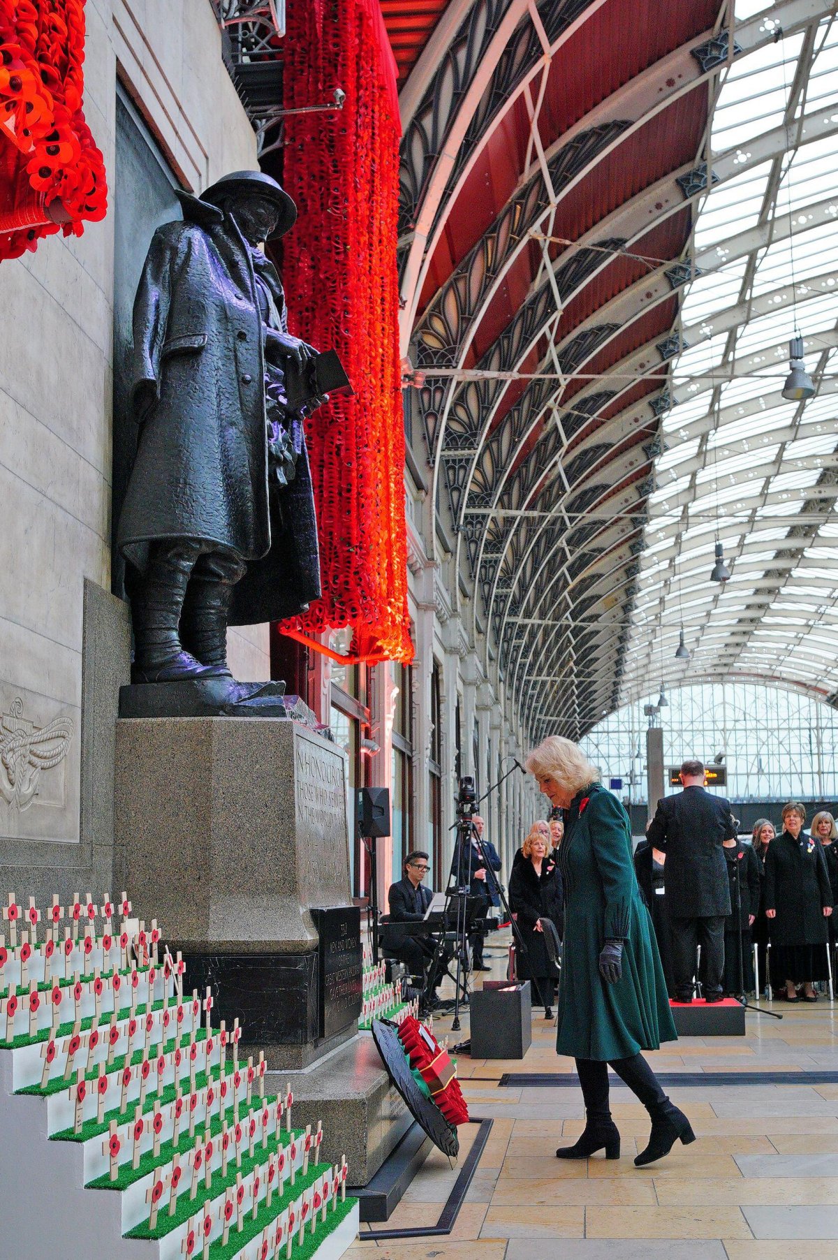 Queen Camilla lays a wreath at London Paddington as part of the Great Western Railway 'Poppies to Paddington' event to mark Armistice Day on November 11, 2025 (Ben Birchall/PA Images/Alamy)