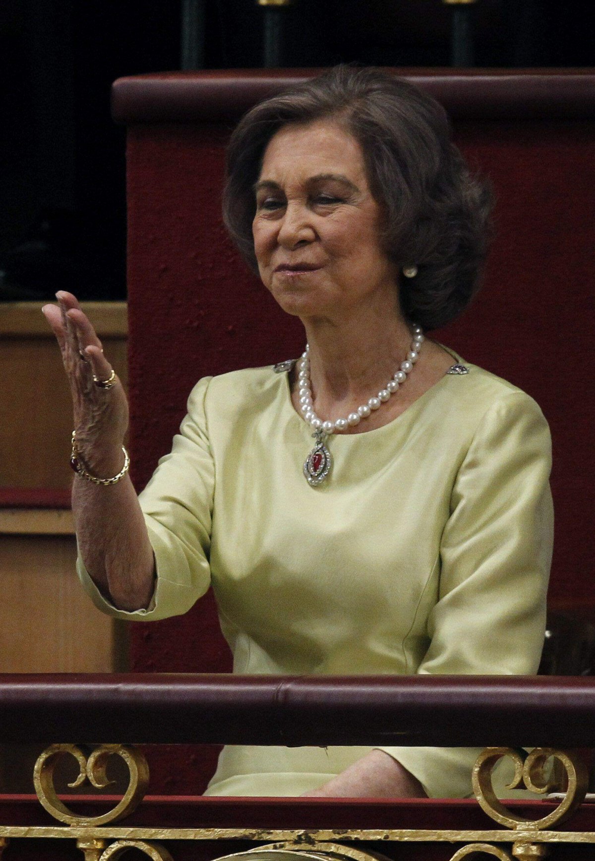 Queen Sofia blows a kiss as her son, King Felipe VI of Spain, makes his first speech before Spain's parliament after his proclamation ceremony in Madrid on June 19, 2014 (Abaca Press/Alamy)