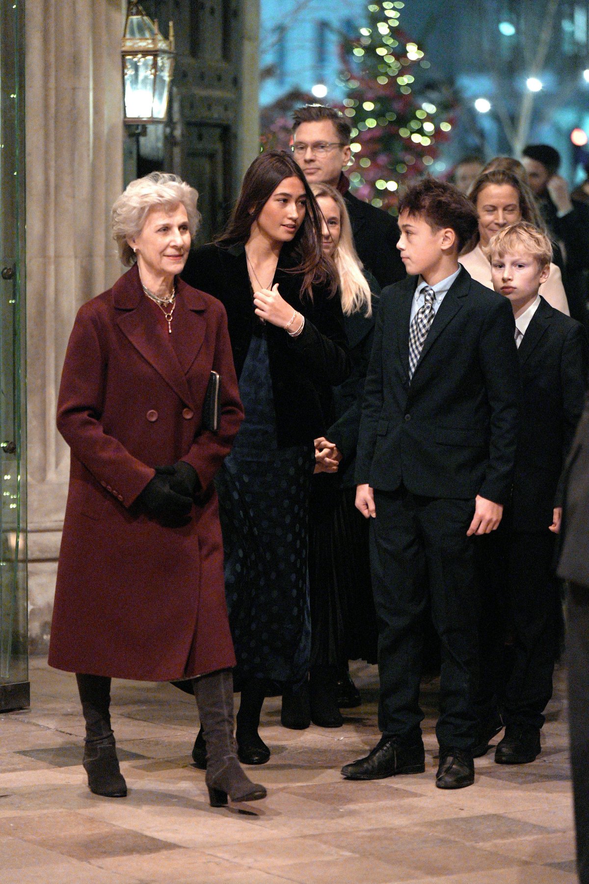 The Duchess of Gloucester, with her children and grandchildren, attends the Together at Christmas concert at Westminster Abbey in London on December 5, 2025 (Aaron Chown/PA Images/Alamy)