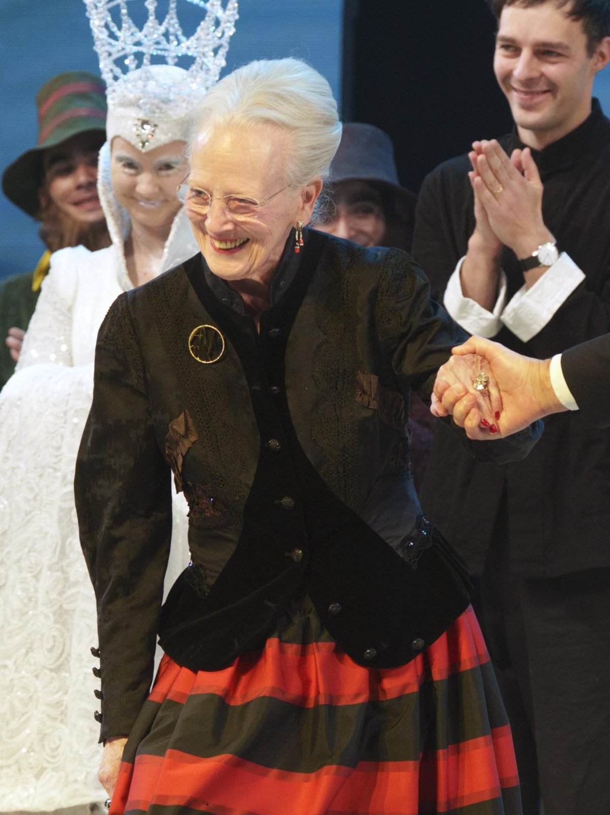 Queen Margrethe of Denmark takes a bow with the cast of this year's Christmas ballet, the Snow Queen, at the Tivoli's Concert Hall on November 27, 2025 (Keld Navntoft/Tivoli Gardens)