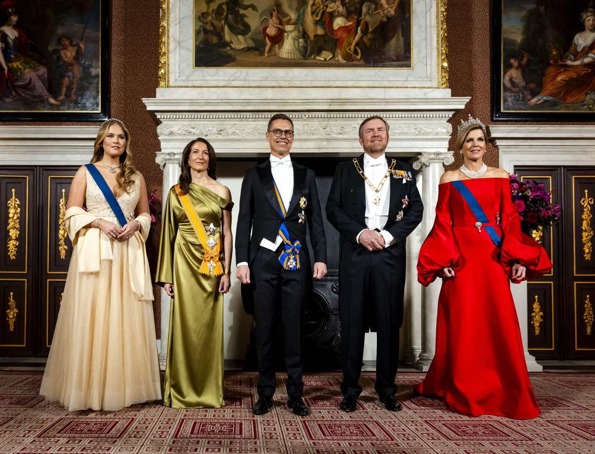 The King and Queen of the Netherlands, with the Princess of Orange, host a state banquet for the visiting President of Finland at the Royal Palace in Amsterdam on December 11, 2025 (REMKO DE WAAL/ANP/Alamy)