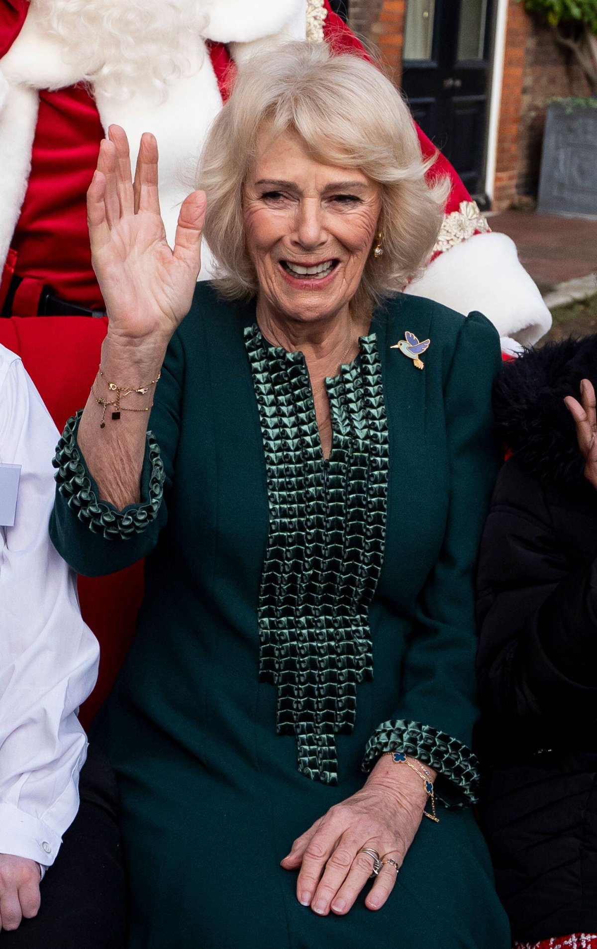 Queen Camilla hosts a Christmas tree decorating party for children from Helen and Douglas House and Roald Dahl's Marvellous Children's Charity at Clarence House in London on December 11, 2025 (Aaron Chown/PA Images/Alamy)