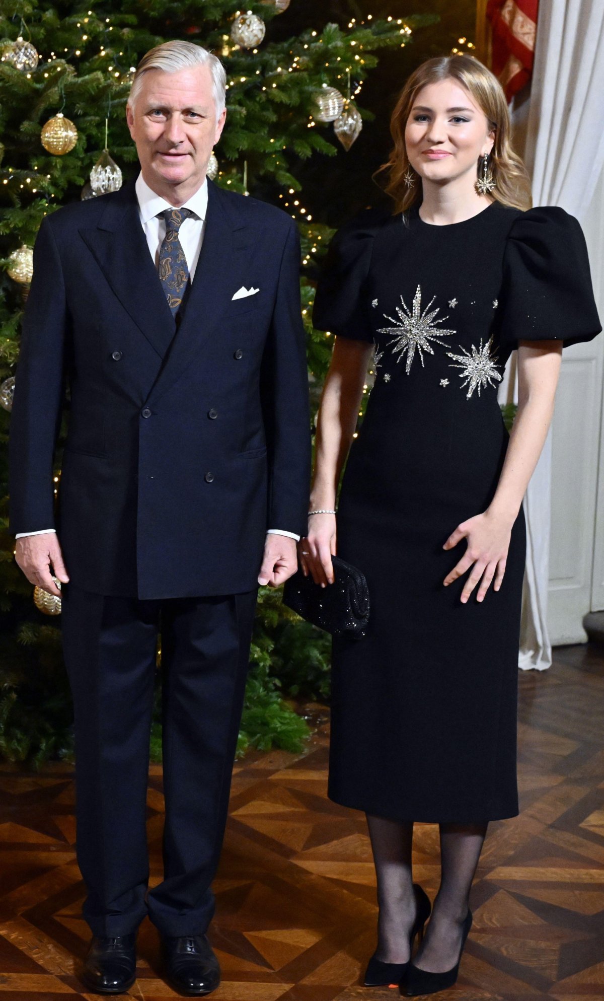 The King and Queen of the Belgians, with the Duchess of Brabant and Princess Eléonore, attend the annual Christmas concert at the Royal Palace in Brussels on December 17, 2025 (ERIC LALMAND/Belga News Agency/Alamy)