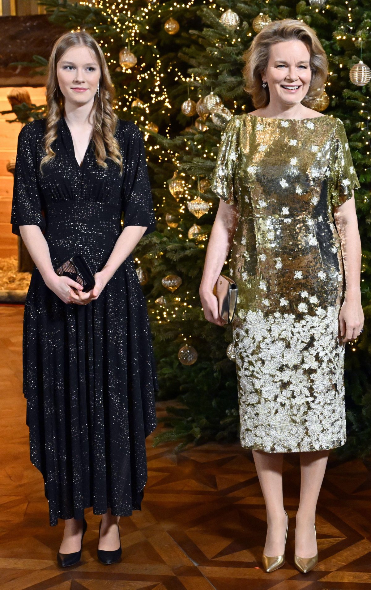 The King and Queen of the Belgians, with the Duchess of Brabant and Princess Eléonore, attend the annual Christmas concert at the Royal Palace in Brussels on December 17, 2025 (ERIC LALMAND/Belga News Agency/Alamy)