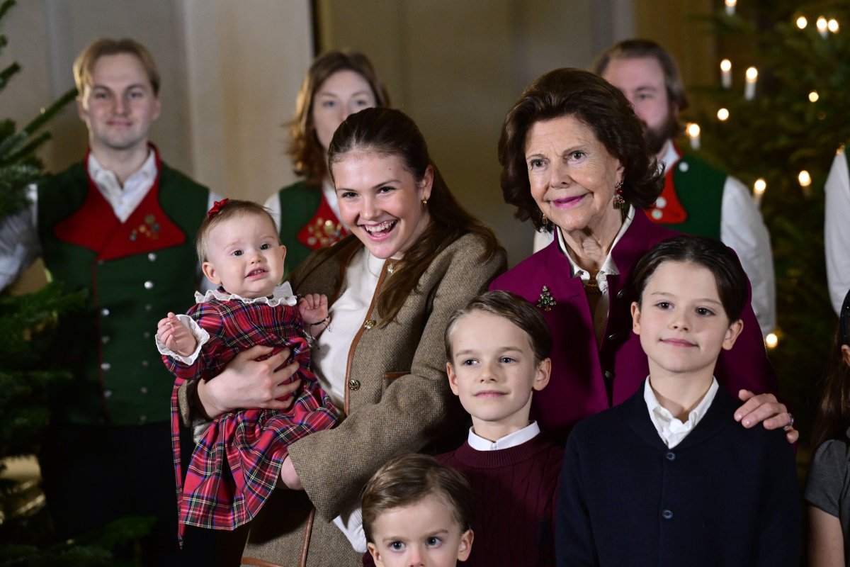 The Queen of Sweden and her grandchildren receive this year's Christmas trees at the Royal Palace in Stockholm on December 15, 2025 (Jonas Ekströmer/TT News Agency/Alamy)