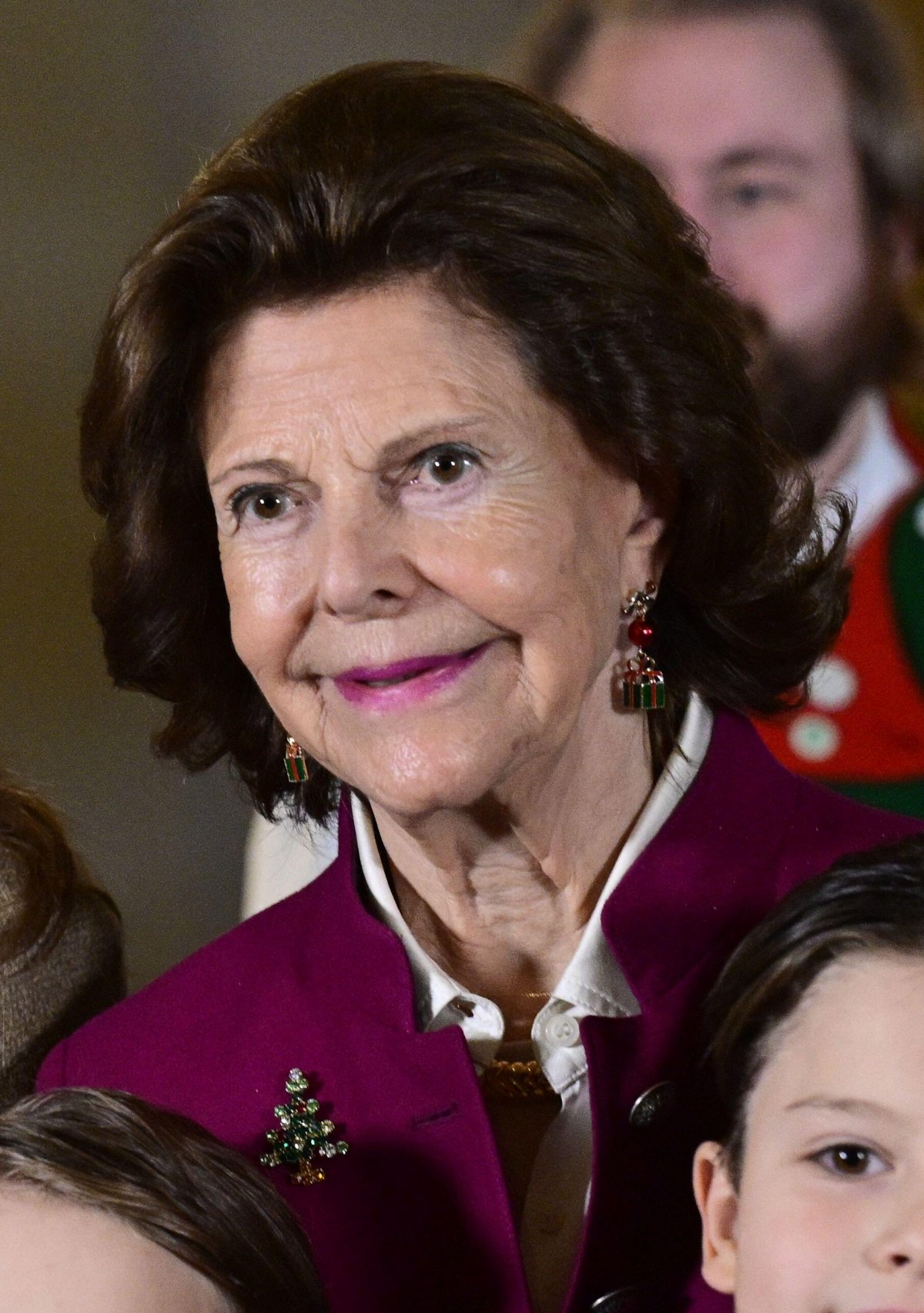 The Queen of Sweden and her grandchildren receive this year's Christmas trees at the Royal Palace in Stockholm on December 15, 2025 (Jonas Ekströmer/TT News Agency/Alamy)