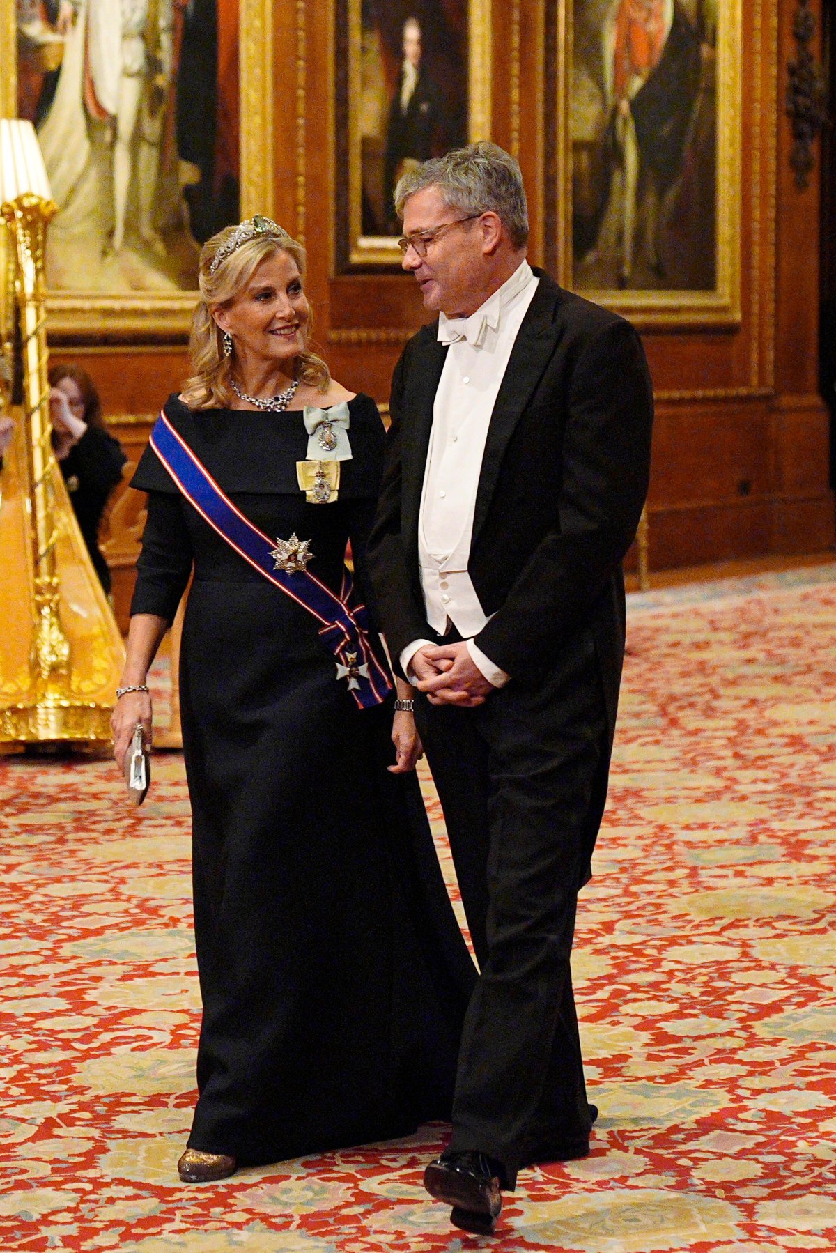 The Duchess of Edinburgh, with Dr. Oliver Schmolke, attends a state banquet in honor of the President of Germany at Windsor Castle on December 3, 2025 (Aaron Chown/PA Images/Alamy)