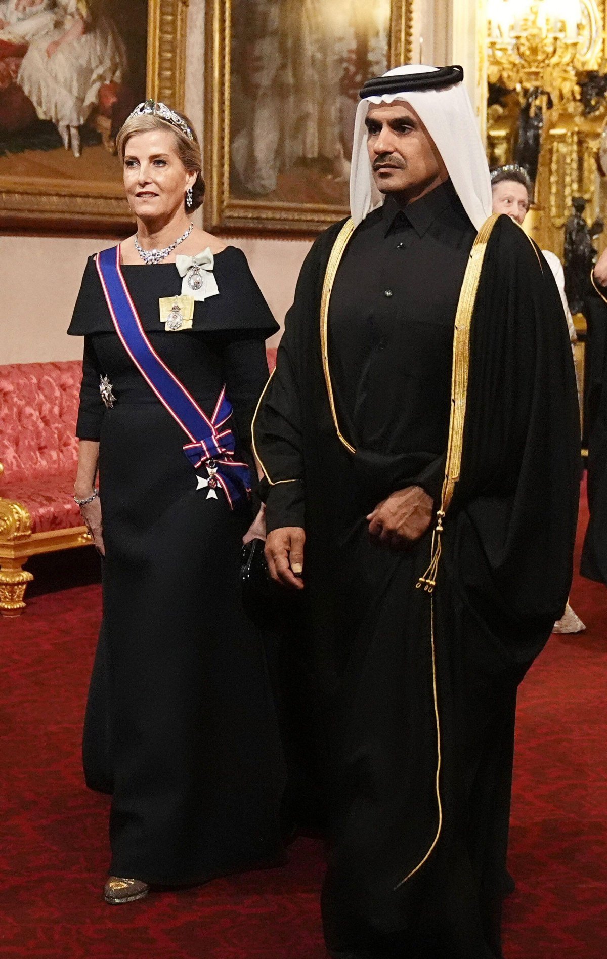 The Duchess of Edinburgh, with Saad bin Sherida Al Kaabi, attends a state banquet in honor of the Emir of Qatar at Buckingham Palace in London on December 3, 2024 (Aaron Chown/PA Images/Alamy)