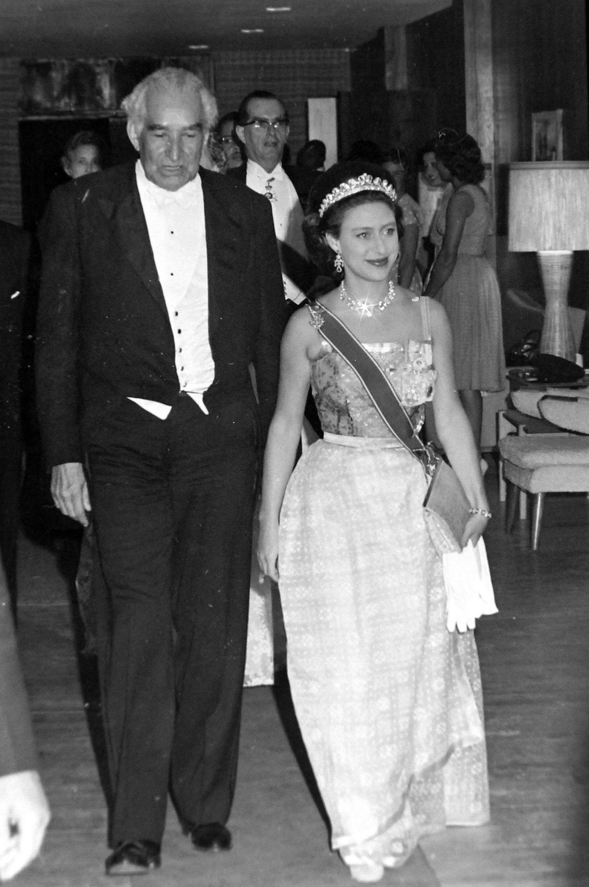 Prime Minister Sir Alexander Bustamante arrives with Princess Margaret for a state banquet celebrating Jamaica’s independence on August 7, 1962 (Smith Archive/Alamy)