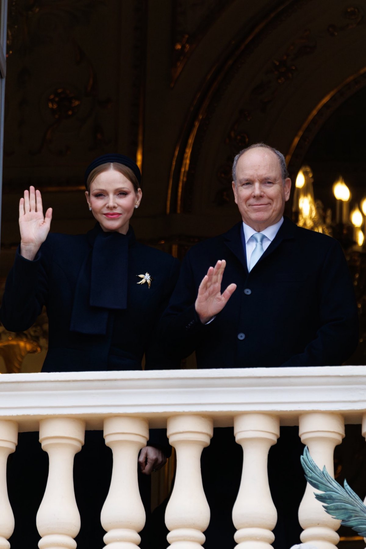 The Prince and Princess of Monaco watch the traditional procession of the relics of Sainte Dévote from the Prince's Palace in Monaco on January 27, 2026 (Michaël Alesi and Sarah Steck/Palais Princier de Monaco)