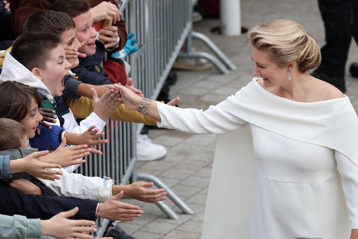 The Grand Duchess of Luxembourg greets local children on the day of her husband's accession to the throne, October 3, 2025 (David Niviere/Abaca Press/Alamy)
