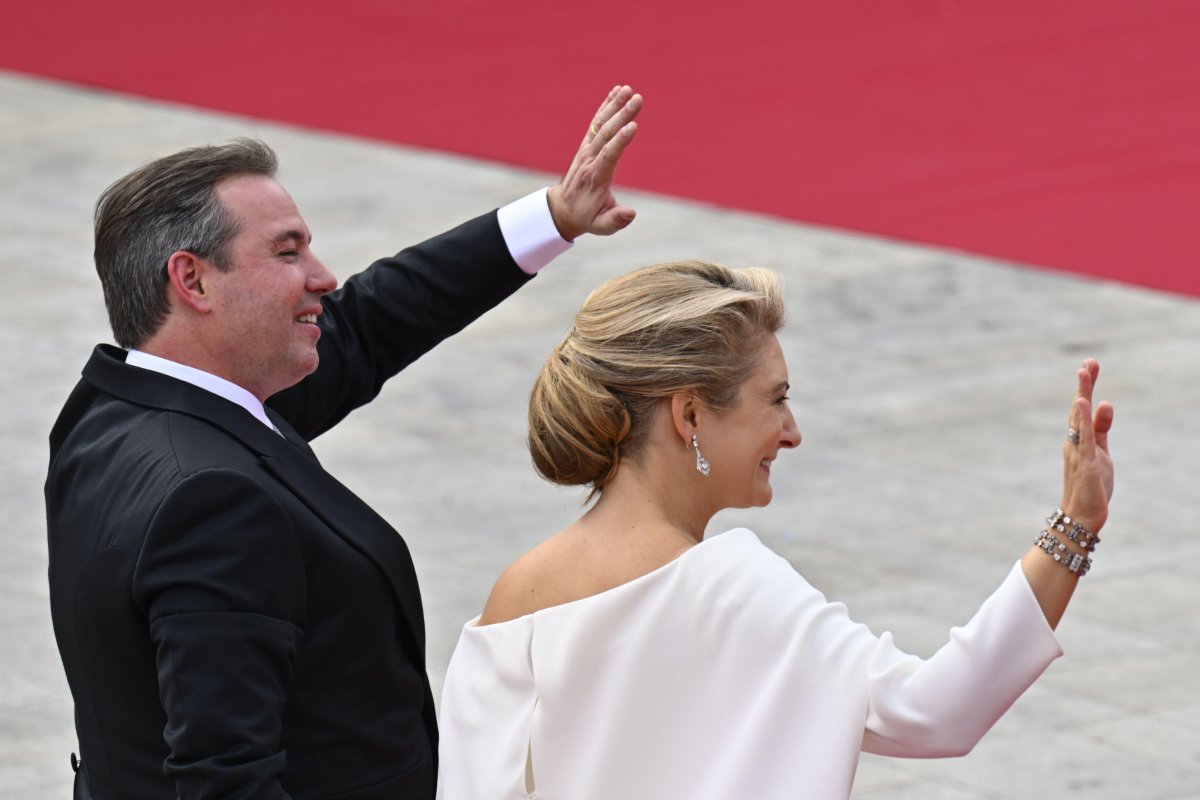 The Grand Duke and Grand Duchess of Luxembourg wave to the crowds on the day of his accession to the throne, October 3, 2025 (Eric Lalmand/Belga News Agency/Alamy)