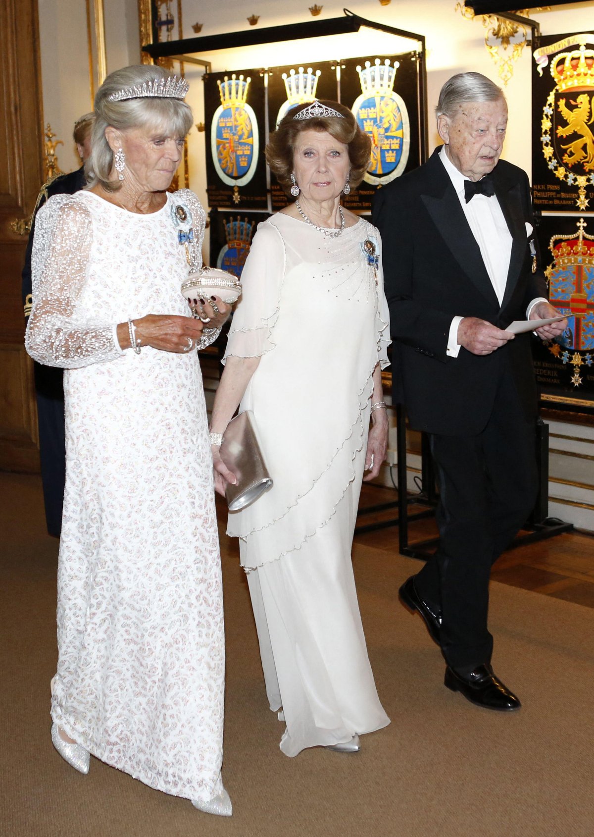Princess Birgitta, Princess Désirée, and Baron Niclas Silfverschiöld attend a banquet celebrating the King of Sweden's 70th birthday at the Royal Palace in Stockholm on April 30, 2016 (Christine Olsson/TT News Agency/Alamy)