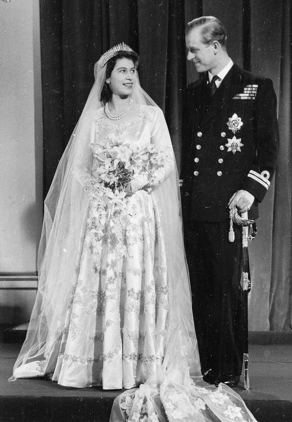 Princess Elizabeth and Prince Philip pose for an official portrait on their wedding day, November 20, 1947 (Associated Press)