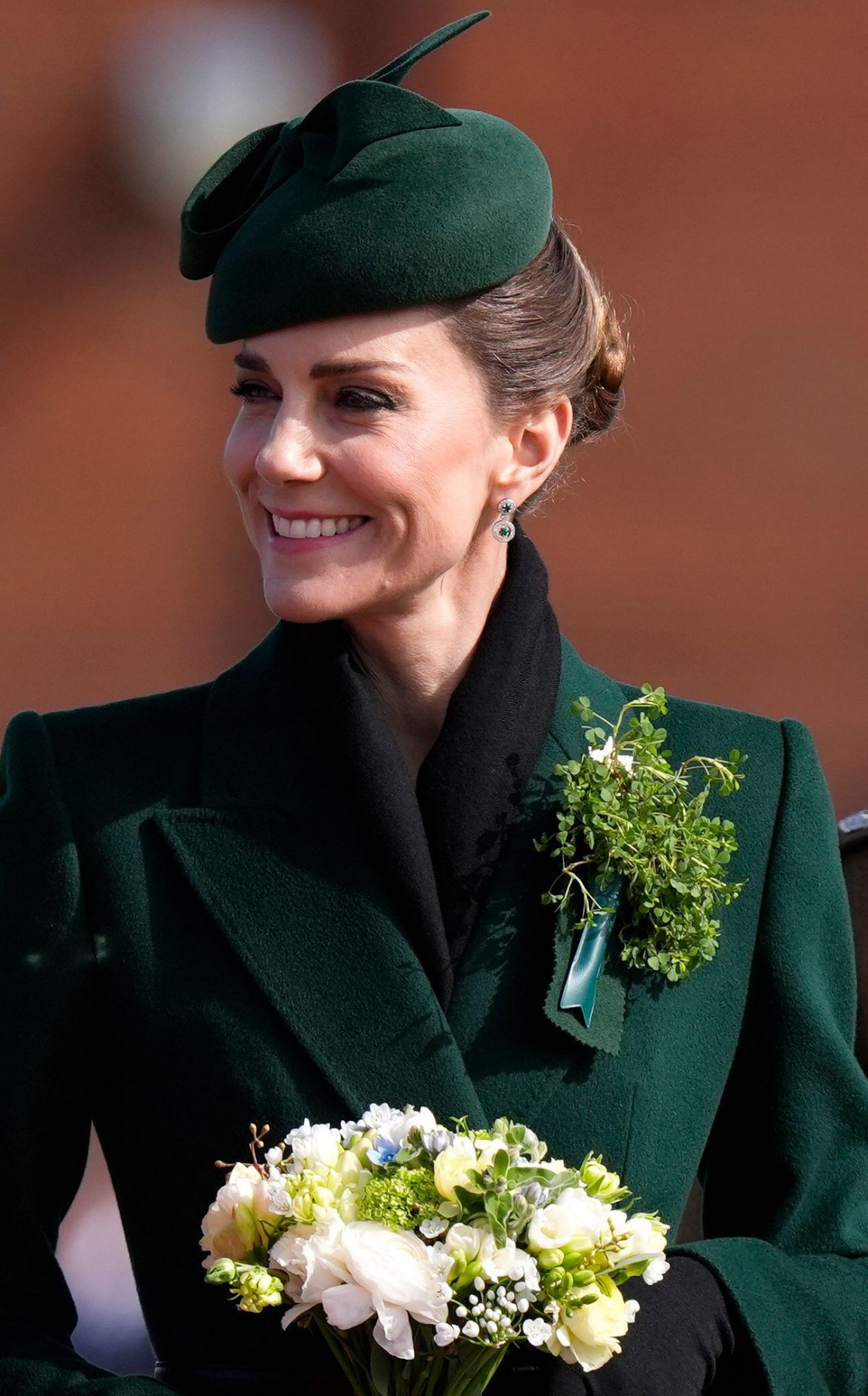 The Princess of Wales presents shamrocks to the Irish Guards on St. Patrick's Day at Mons Barracks in Aldershot on March 17, 2026 (Andrew Matthews/PA Images/Alamy)
