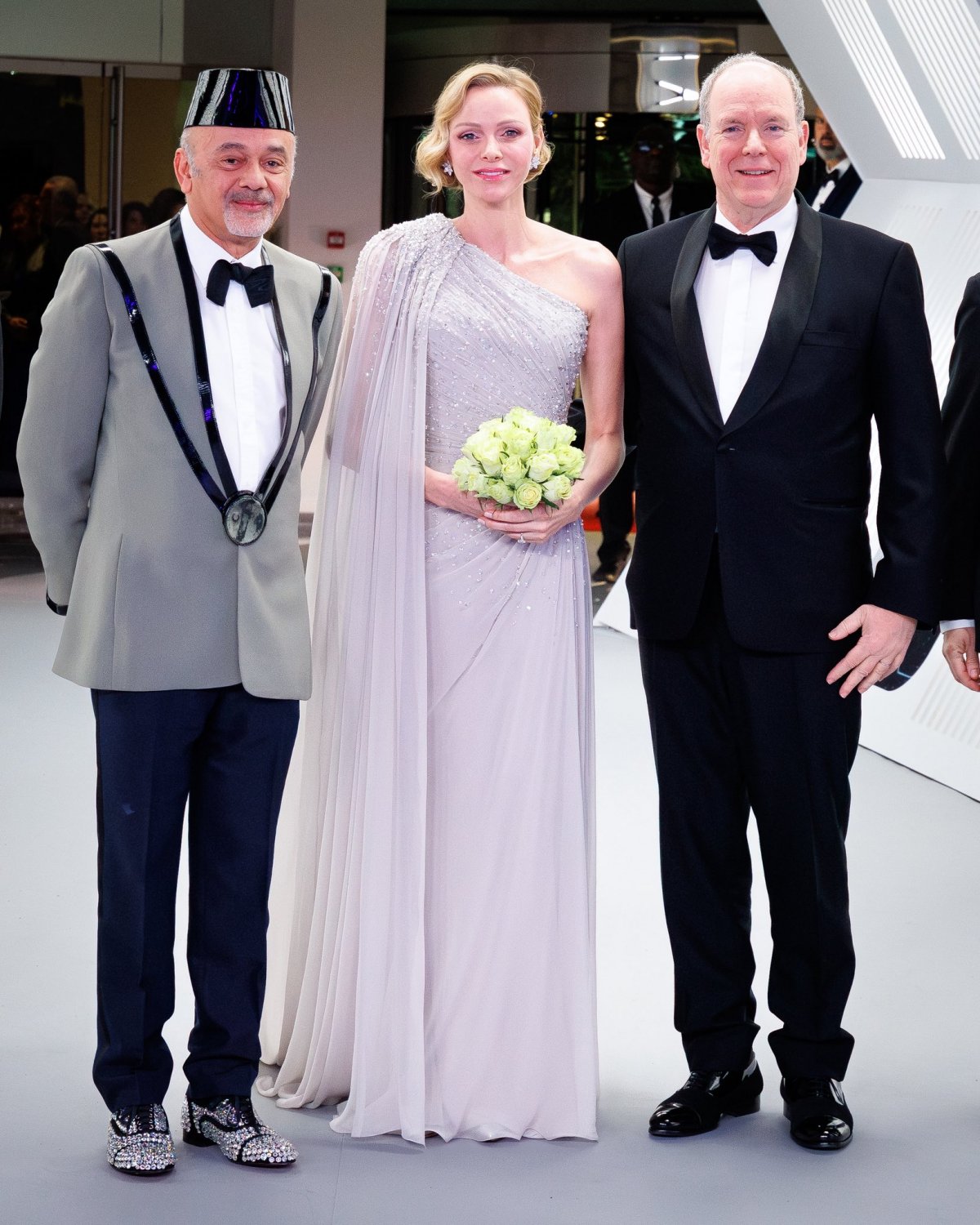 The Prince and Princess of Monaco, with Christian Louboutin, attend the Bal de Rose on March 21, 2026 (Michaël Alesi/Palais Princier de Monaco)