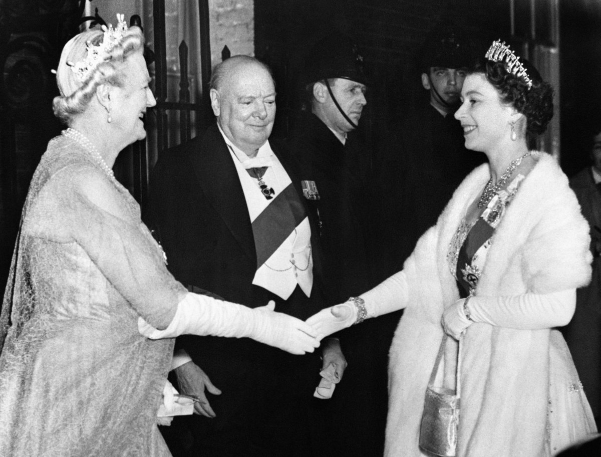 Queen Elizabeth II and the Duke of Edinburgh arrive for a dinner party given by Winston and Clementine Churchill at Downing Street in London on April 4, 1955 (PA Images/Alamy)