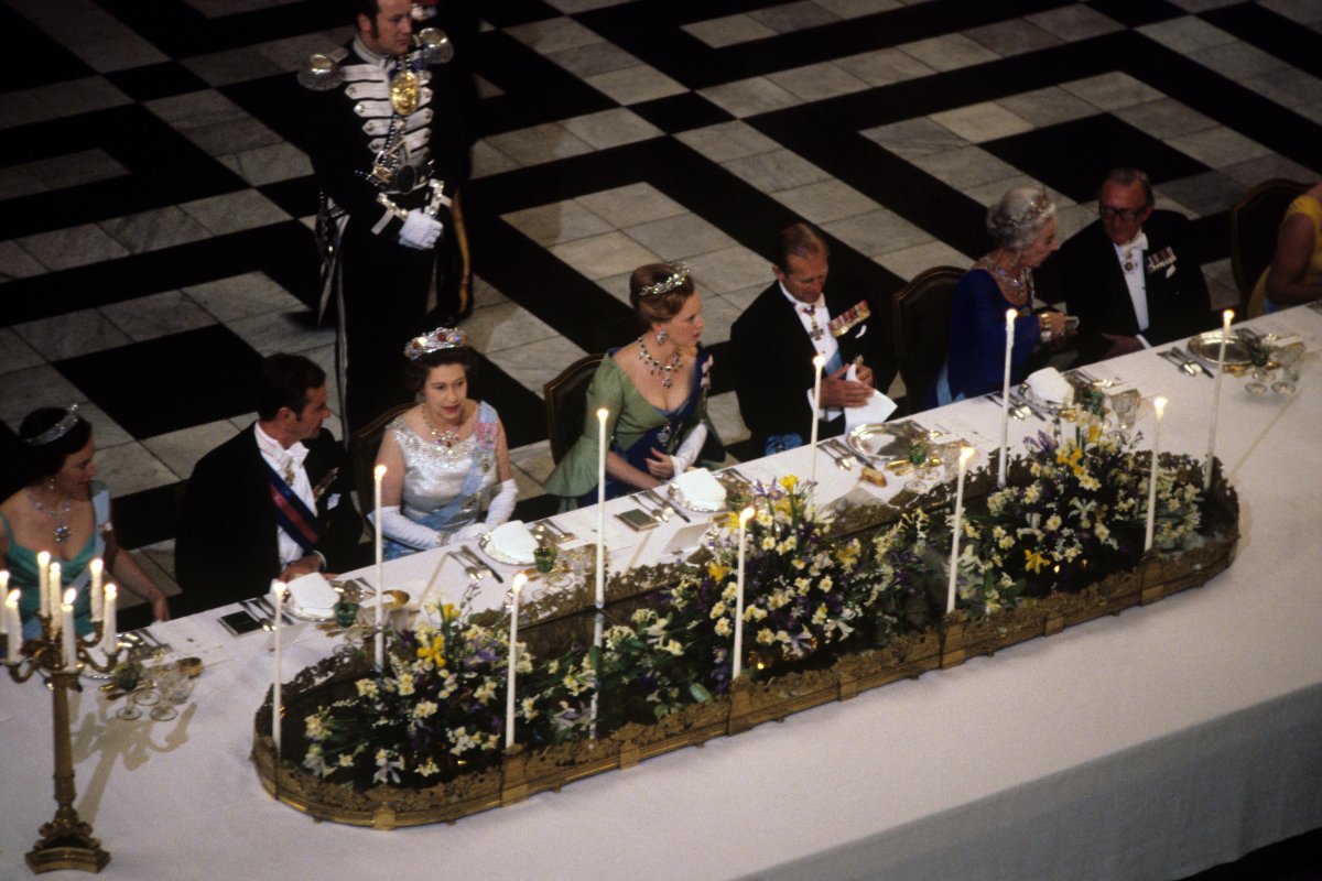 Queen Margrethe II and Prince Henrik of Denmark host a state banquet in honor of Queen Elizabeth II and Prince Philip of the United Kingdom at Christiansborg Palace in Copenhagen on May 16, 1979 (PA Images/Alamy)