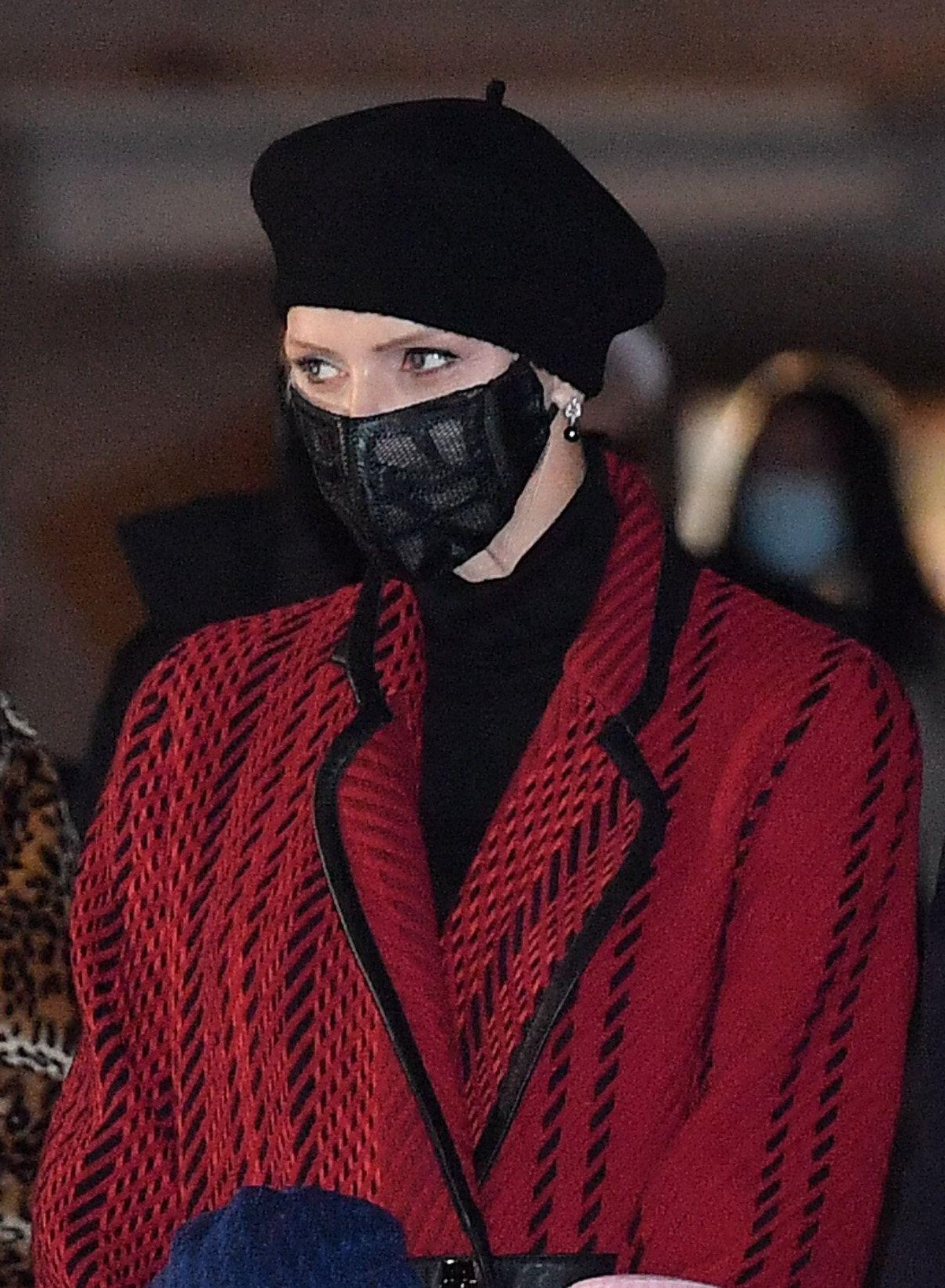 The Princess of Monaco attends the traditional burning of the boat on Quai Albert I on the eve of the Feast of Sainte Dévote in Monaco on January 26, 2021 (Stephane Cardinale/Abaca Press/Alamy)