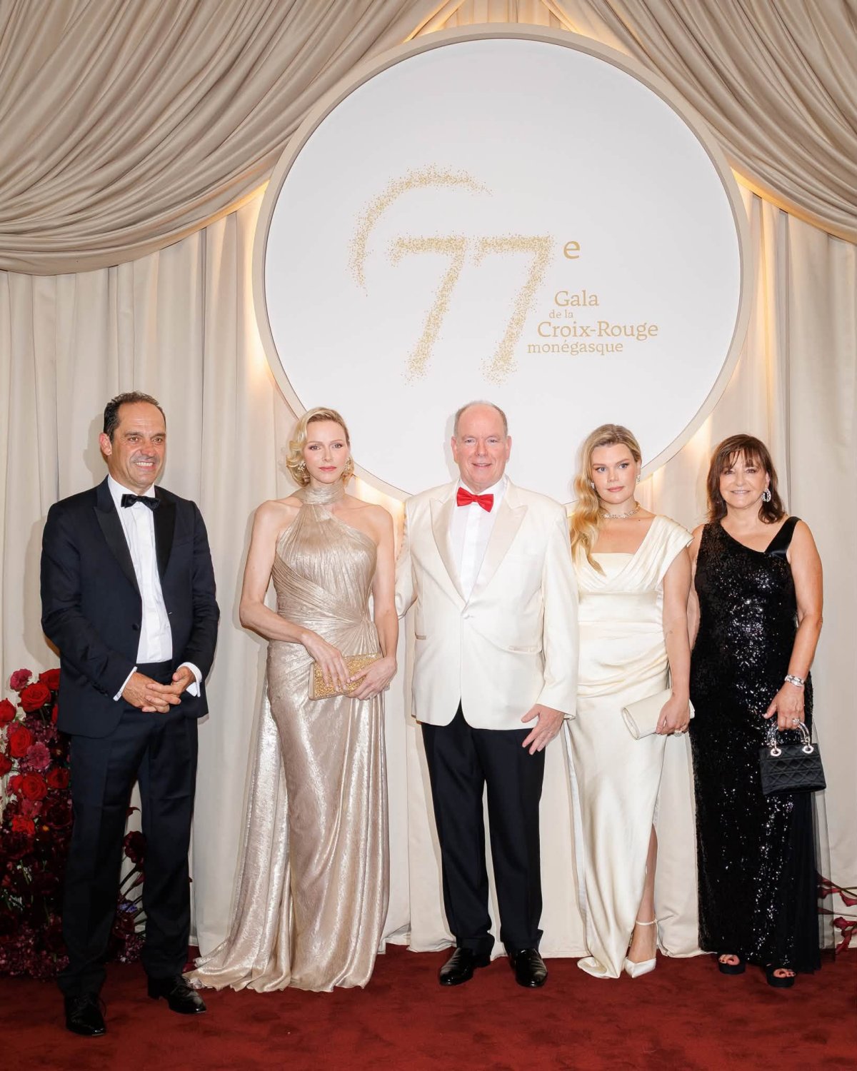 The Prince and Princess of Monaco, with Camille Gottlieb, attend the 77th Monegasque Red Cross Gala at the Salle des Étoiles of the Sporting Monte-Carlo on July 18, 2026 (Michaël Alesi/Palais Princier de Monaco)