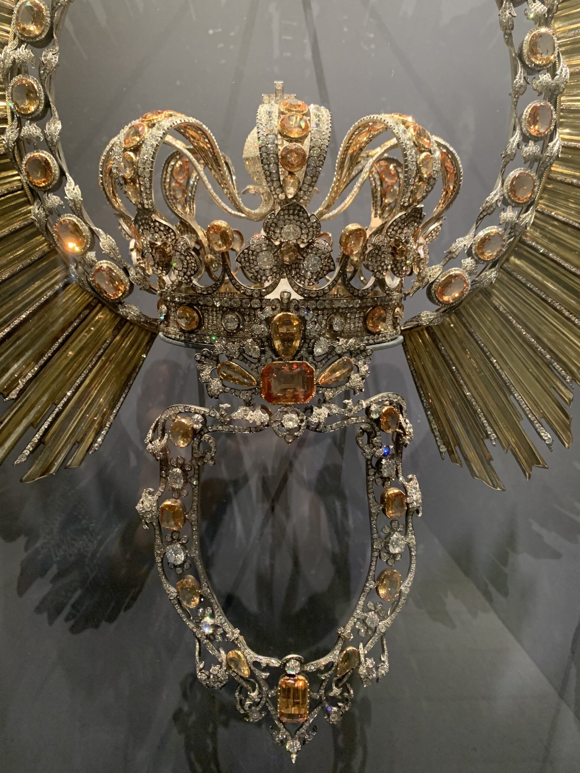 The crown, wimple, and halo of Our Lady of Atocha and the crown of the Christ Child on display at the Royal Basilica of Our Lady of Atocha, 2026 (Photo generously shared by Miss Glossop)