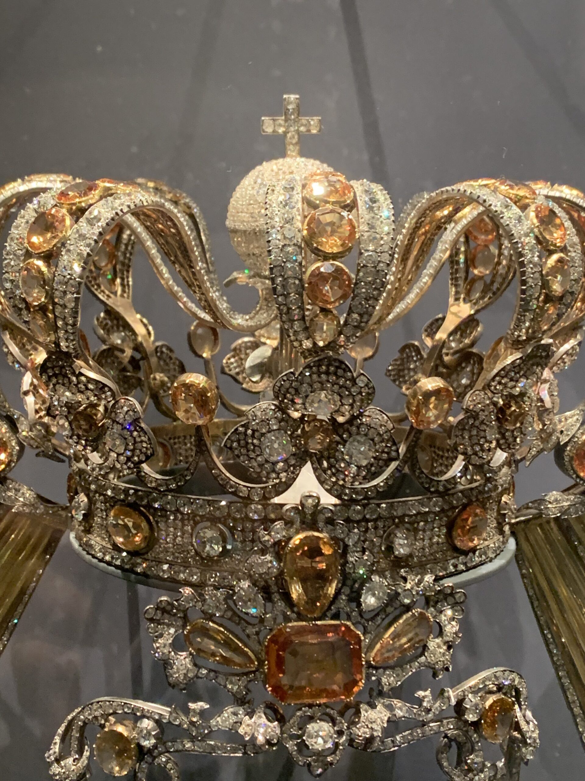 The crown, wimple, and halo of Our Lady of Atocha and the crown of the Christ Child on display at the Royal Basilica of Our Lady of Atocha, 2026 (Photo generously shared by Miss Glossop)