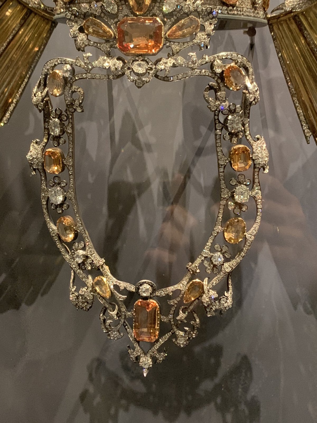 The crown, wimple, and halo of Our Lady of Atocha and the crown of the Christ Child on display at the Royal Basilica of Our Lady of Atocha, 2026 (Photo generously shared by Miss Glossop)