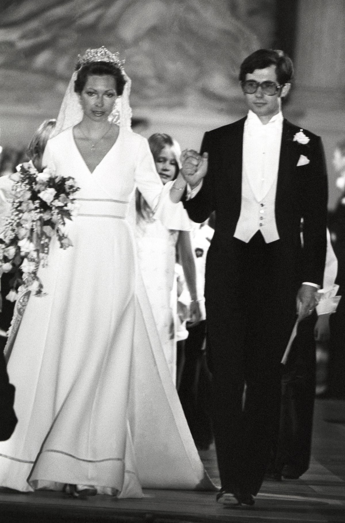 Princess Christina of Sweden and Tord Magnuson are pictured on their wedding day in Stockholm, June 15, 1974 (Roger Tillberg/Alamy)