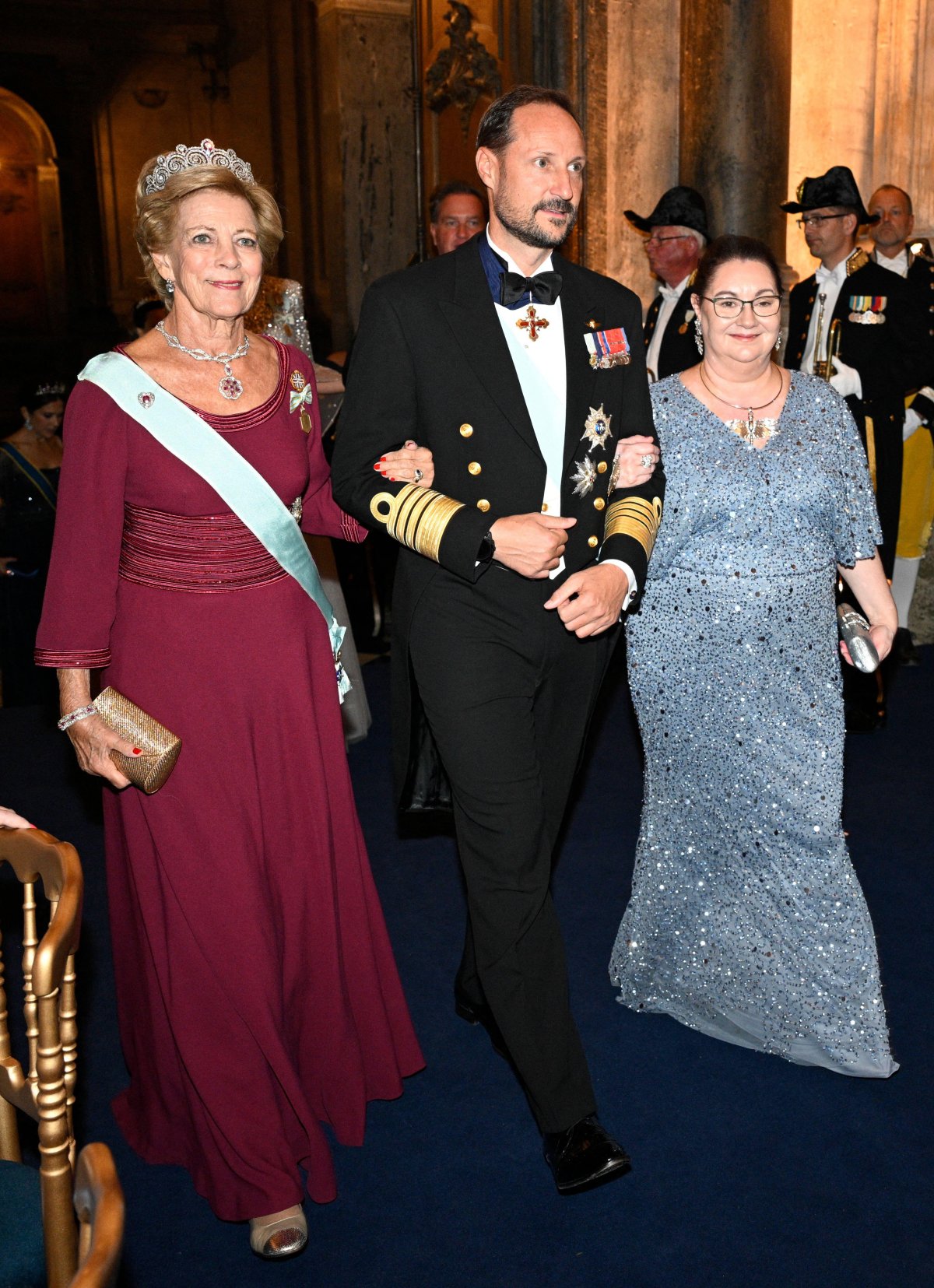 Queen Anne-Marie, with the Crown Prince of Norway and Helena Norlen, attends a gala banquet celebrating the King of Sweden's Golden Jubilee at the Royal Palace in Stockholm on September 15, 2023 (Anders Wiklund/TT News Agency/Alamy)
