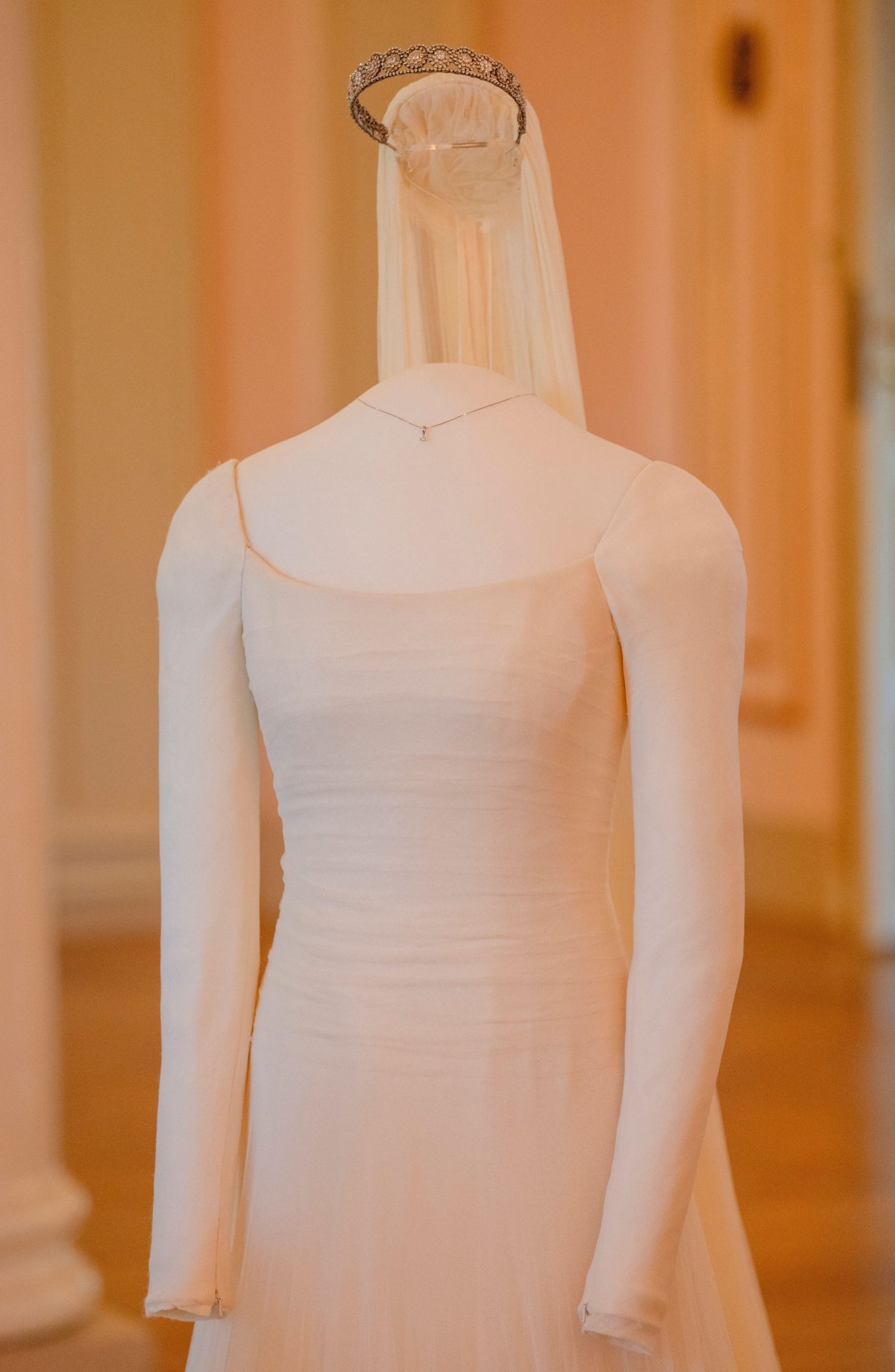 The dress worn by Crown Princess Mette-Marit on her wedding day is displayed at the Royal Palace in Oslo on June 18, 2026 (Stian Lysberg Solum/NTB/Alamy)