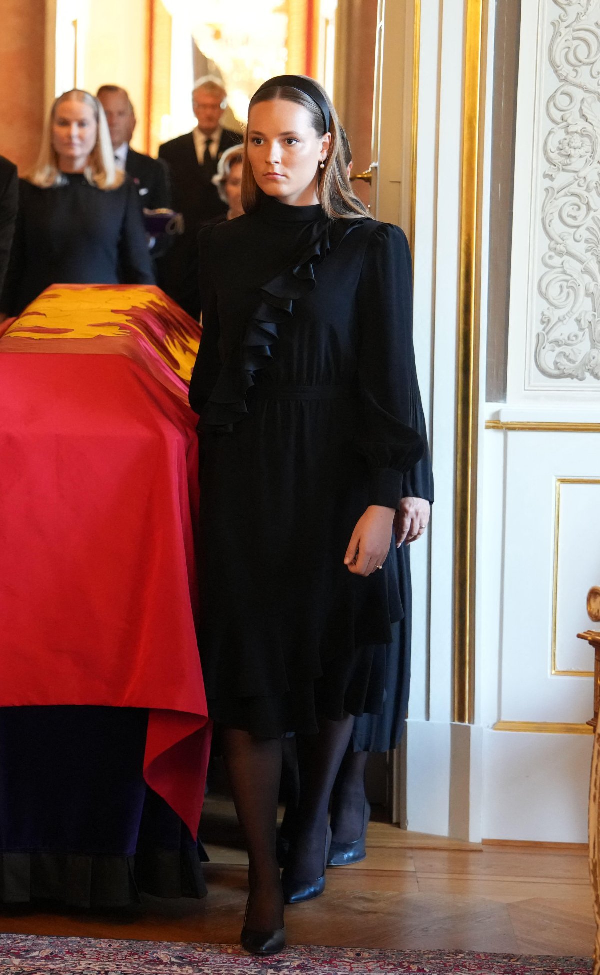 Crown Princess Ingrid Alexandra brings the coffin of King Harald V of Norway into the Royal Chapel at the Royal Palace in Oslo on August 31, 2026 (Ole Berg-Rusten/NTB/Alamy)
