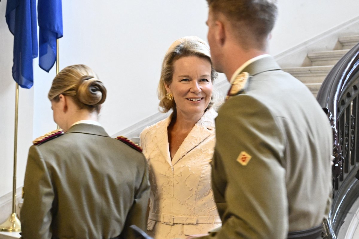 The King and Queen of the Belgians, with the Duchess of Brabant, celebrate Prince Gabriel's graduation from the Royal Military Academy in Brussels on August 27, 2026 (ERIC LALMAND/Belga News Agency/Alamy)
