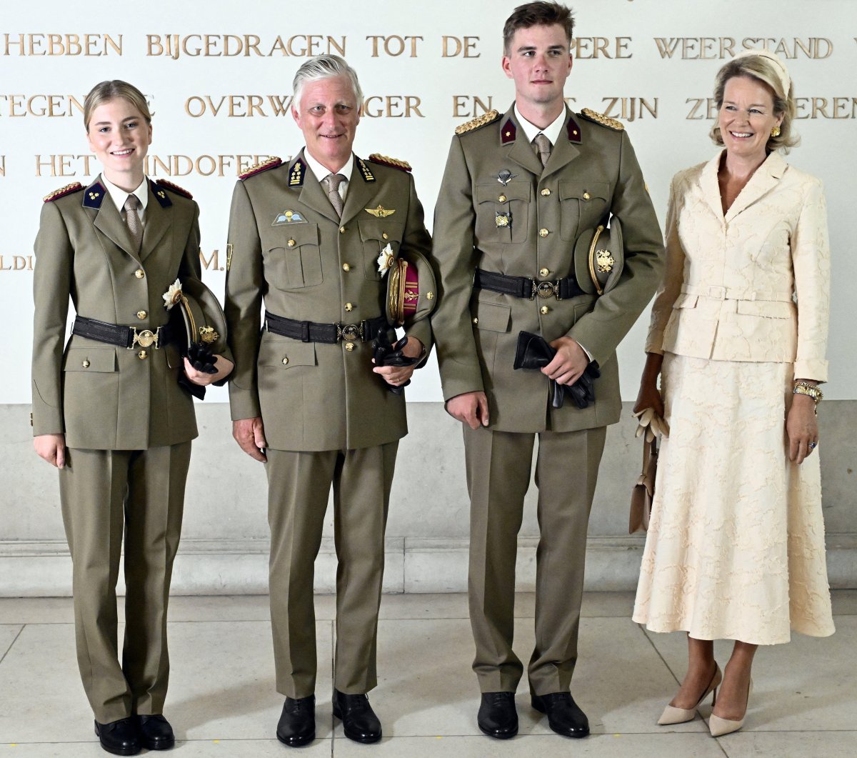 The King and Queen of the Belgians, with the Duchess of Brabant, celebrate Prince Gabriel's graduation from the Royal Military Academy in Brussels on August 27, 2026 (ERIC LALMAND/Belga News Agency/Alamy)