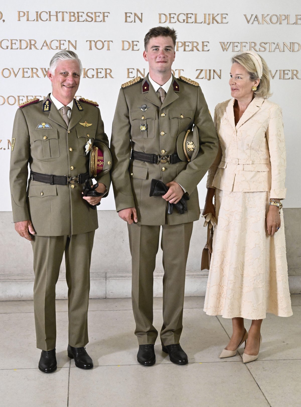 The King and Queen of the Belgians, with the Duchess of Brabant, celebrate Prince Gabriel's graduation from the Royal Military Academy in Brussels on August 27, 2026 (ERIC LALMAND/Belga News Agency/Alamy)