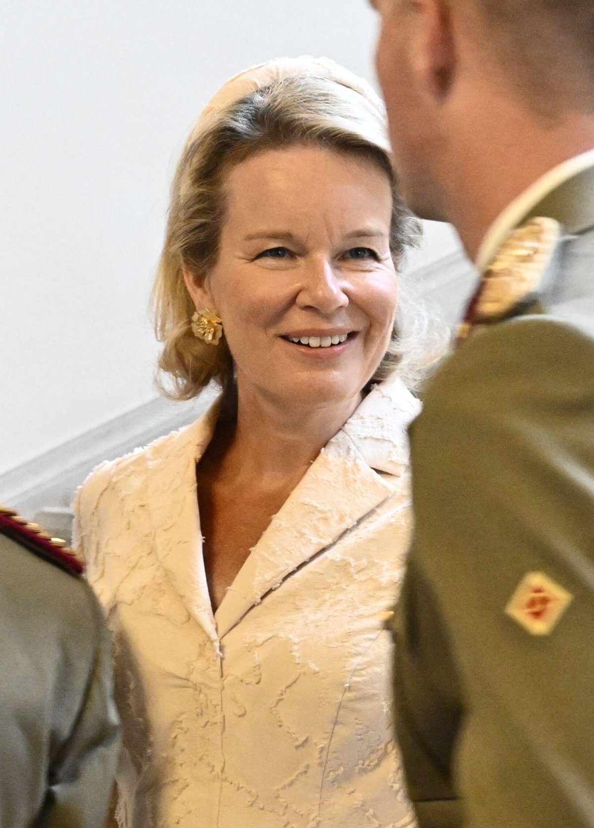 The King and Queen of the Belgians, with the Duchess of Brabant, celebrate Prince Gabriel's graduation from the Royal Military Academy in Brussels on August 27, 2026 (ERIC LALMAND/Belga News Agency/Alamy)