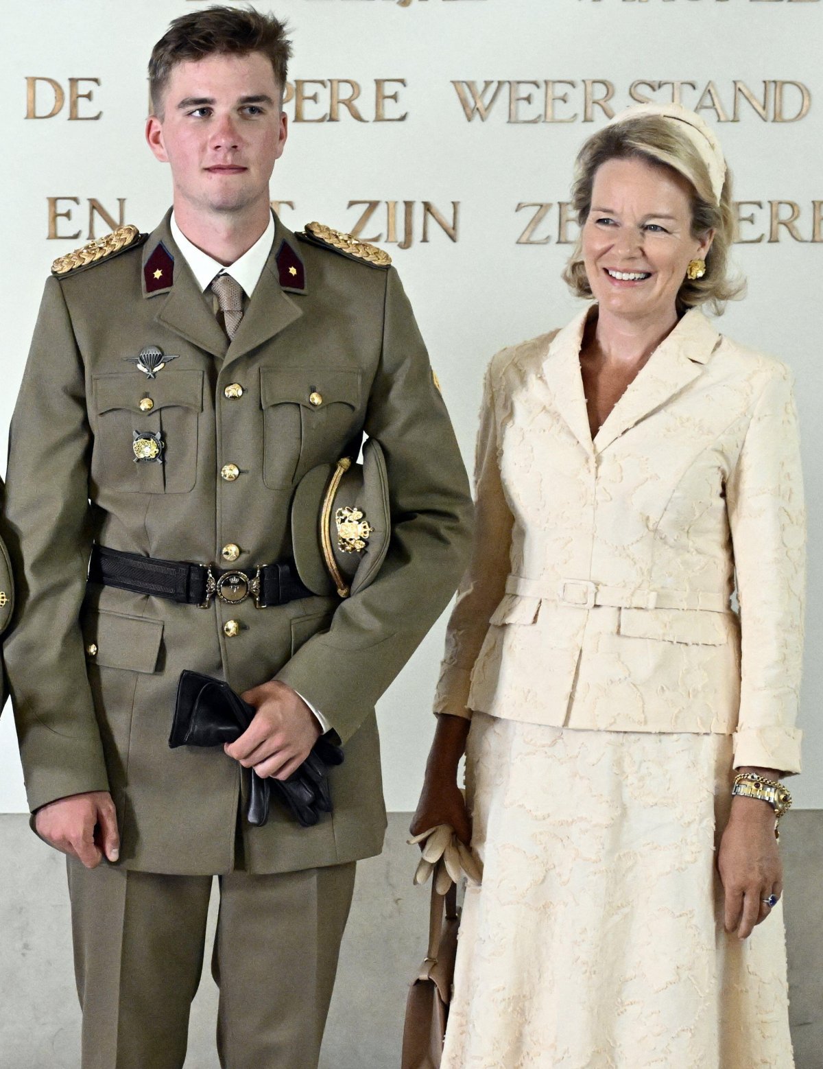 The King and Queen of the Belgians, with the Duchess of Brabant, celebrate Prince Gabriel's graduation from the Royal Military Academy in Brussels on August 27, 2026 (ERIC LALMAND/Belga News Agency/Alamy)