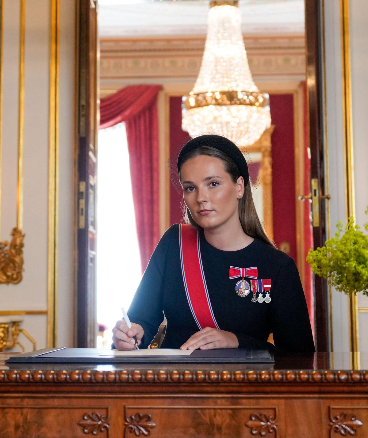 The Crown Princess of Norway signs an oath to the constitution at the Royal Palace in Oslo on September 1, 2026 (Fredrik Varfjell/NTB/Alamy)