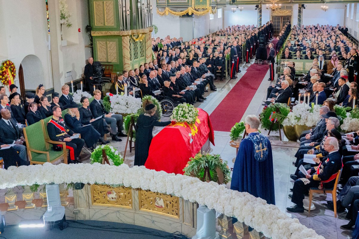 Queen Sonja places a rose on King Harald V's coffin during his funeral in Oslo on September 9, 2026 (Stian Lysberg Solum/NTB/Alamy)